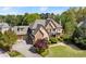 Attractive home with well-maintained lawn, mature landscaping, and a welcoming entrance at 3562 Langley Oaks Se Ct, Marietta, GA 30067
