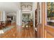 Grand foyer featuring gleaming hardwood floors, soaring ceilings, and elegant architectural details at 3562 Langley Oaks Se Ct, Marietta, GA 30067