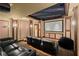 Home theater featuring a large screen, comfortable seating, and mood lighting at 3562 Langley Oaks Se Ct, Marietta, GA 30067