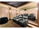 Luxurious home theater with reclining leather seats, a starry ceiling, and tiered flooring at 3562 Langley Oaks Se Ct, Marietta, GA 30067