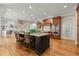 Well-appointed kitchen with an island, breakfast bar, and stainless steel appliances at 3562 Langley Oaks Se Ct, Marietta, GA 30067