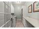 Clean laundry room features modern washer/dryer, ample counter space, and storage cabinets at 3562 Langley Oaks Se Ct, Marietta, GA 30067