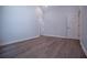Bright bedroom featuring wood-look flooring, light colored walls and white trim at 4694 E Glen Ridge E Cir, Winston, GA 30187