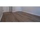 Bedroom features wood-look flooring, neutral paint and large closet at 4694 E Glen Ridge E Cir, Winston, GA 30187