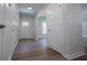 Inviting entryway featuring a modern front door, wood-look floors and neutral color palette at 4694 E Glen Ridge E Cir, Winston, GA 30187