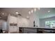 Well-lit kitchen with stainless steel appliances, modern cabinets, and a sink overlooking the backyard at 4694 E Glen Ridge E Cir, Winston, GA 30187