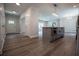 Modern kitchen featuring a center island with seating and stainless steel appliances at 4694 E Glen Ridge E Cir, Winston, GA 30187