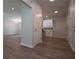 Open-concept living space with modern flooring, recessed lighting, and neutral color palette at 4694 E Glen Ridge E Cir, Winston, GA 30187