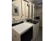 Modern laundry area with front loading washer and dryer for convenient laundry tasks at 5399 Kristian Ct, Stone Mountain, GA 30088