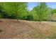 Lawn of the backyard featuring young trees at 687 Avondale Creek Dr, Decatur, GA 30032