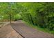 Walking path along the border of the backyard at 687 Avondale Creek Dr, Decatur, GA 30032