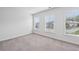 Bright bedroom with plush carpet and large windows at 687 Avondale Creek Dr, Decatur, GA 30032