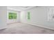 Spacious carpeted bedroom with windows allowing ample natural light at 687 Avondale Creek Dr, Decatur, GA 30032
