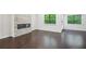 Bright living room featuring a fireplace and hardwood floors at 687 Avondale Creek Dr, Decatur, GA 30032