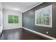Living room featuring hardwood floors and large windows at 687 Avondale Creek Dr, Decatur, GA 30032