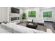 Bright living room featuring a fireplace, hardwood floors, and large windows at 687 Avondale Creek Dr, Decatur, GA 30032