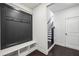 Mud room features a built in mud bench with storage space and stairs at 687 Avondale Creek Dr, Decatur, GA 30032