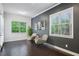 Sitting room featuring hardwood floors and large windows at 687 Avondale Creek Dr, Decatur, GA 30032