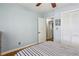 Light-filled bedroom features hardwood floors and a closet at 1110 Tuxedo Dr, Roswell, GA 30075