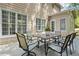 A patio with seating and view of the backyard at 2130 Federal Rd, Roswell, GA 30075