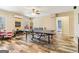 The game room features a ping pong table, seating area, and natural light at 283 Rosebay Ln, Sharpsburg, GA 30277