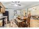 The kitchen features wood cabinets, dining table, and hardwood flooring at 283 Rosebay Ln, Sharpsburg, GA 30277