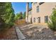 Spacious backyard featuring a partially fenced yard and ample space for outdoor activities or future landscaping at 3704 Wilkins Cir, Powder Springs, GA 30127