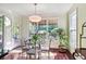 Charming breakfast nook with bright windows and a view of the backyard at 3704 Wilkins Cir, Powder Springs, GA 30127