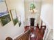 Grand foyer with high ceilings, chandelier, hardwood floors, and decorative paintings at 3704 Wilkins Cir, Powder Springs, GA 30127