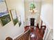 Grand foyer with hardwood floors, a chandelier, and elegant staircase leading to the upper level at 3704 Wilkins Cir, Powder Springs, GA 30127