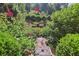 Serene garden path surrounded by lush greenery, offering a tranquil retreat at 3704 Wilkins Cir, Powder Springs, GA 30127