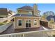 Large deck leading to sunroom with fenced-in yard and easy access to the house at 877 Ashwood Walk, Decatur, GA 30030