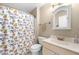 Charming bathroom with cat-themed shower curtain, classic sink vanity, and neutral color palette at 877 Ashwood Walk, Decatur, GA 30030