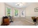 Well-lit bonus room with neutral tones, bright windows and ample space perfect for work or play at 877 Ashwood Walk, Decatur, GA 30030