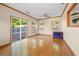 Bright living room with hardwood floors and sliding doors leading to an outdoor deck at 877 Ashwood Walk, Decatur, GA 30030