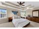 Spacious main bedroom with a ceiling fan, lots of natural light, and ample closet space at 877 Ashwood Walk, Decatur, GA 30030
