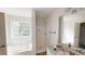 Relaxing bathroom with a large soaking tub and a separate shower at 645 Woodwind Dr, Rockmart, GA 30153