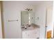 Traditional bathroom with a vanity and a well-lit mirror for grooming ease at 645 Woodwind Dr, Rockmart, GA 30153