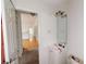 Bathroom with single sink vanity, mirror and toilet at 645 Woodwind Dr, Rockmart, GA 30153