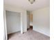 Simple bedroom featuring carpet and closet at 645 Woodwind Dr, Rockmart, GA 30153
