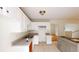 The kitchen features ample counter space and white cabinets at 645 Woodwind Dr, Rockmart, GA 30153