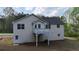 Two-story home featuring a private balcony and backyard access at 645 Woodwind Dr, Rockmart, GA 30153