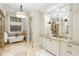 Elegant bathroom with double vanities, a soaking tub, walk-in shower, decorative tile, and luxurious fixtures at 7305 Breeze Bay Rd, Cumming, GA 30041