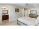 Bedroom featuring ensuite bathroom access and classic decor elements at 7305 Breeze Bay Rd, Cumming, GA 30041