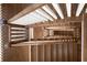 View looking down a wooden staircase with white accents at 7305 Breeze Bay Rd, Cumming, GA 30041