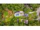 Aerial view of a luxury home featuring a stunning pool and expertly manicured grounds at 808 Lullwater Ne Rd, Atlanta, GA 30307