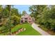 Beautiful brick home with lush lawn and a curved driveway at 808 Lullwater Ne Rd, Atlanta, GA 30307