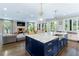 Open concept kitchen featuring a large island, seating and easy access to living room at 808 Lullwater Ne Rd, Atlanta, GA 30307