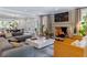 Spacious living room featuring a fireplace, hardwood floors, and a modern open layout at 808 Lullwater Ne Rd, Atlanta, GA 30307