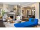 Living room with fireplace, hardwood floors, neutral palette, and connected dining area at 808 Lullwater Ne Rd, Atlanta, GA 30307